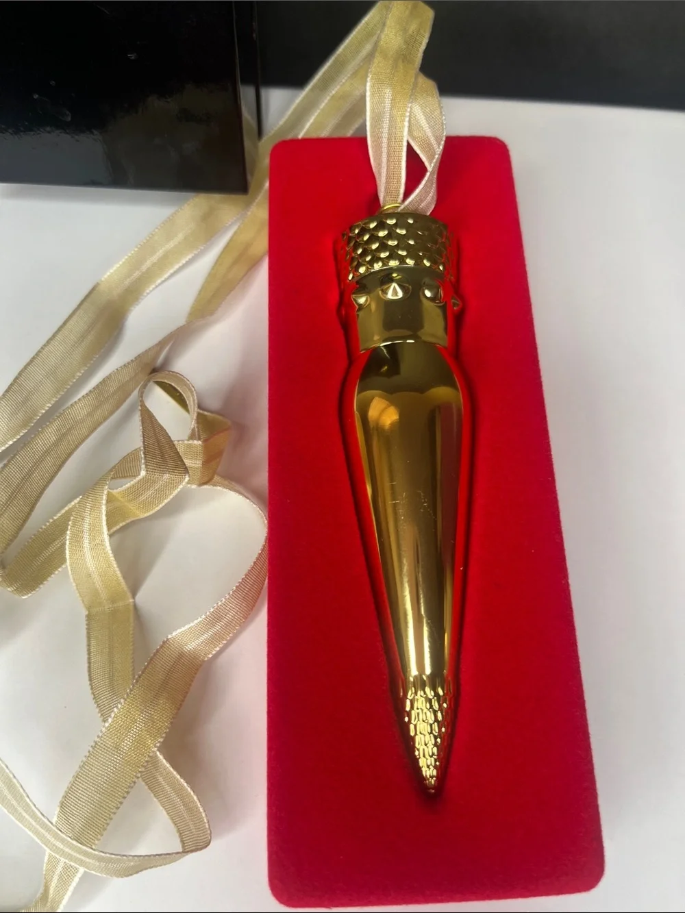 Christian Louboutin Gold Bullet Lipstick in Bright Coral Pink